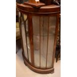 A 1960s-1970s teak display cabinet top four-shelf unit over cabinet with single shelf above pair of