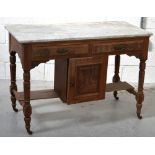 An Edwardian mahogany and walnut marble-topped wash stand,
