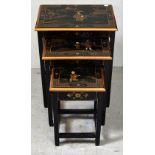 A nest of three Oriental black lacquer tables,