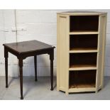 An Edwardian side table on tapering supports and a cream-painted corner unit with four shelves,