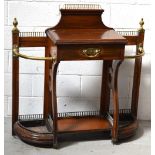 A Shoolbred & Co oak hall stand with cast brass gallery, brass finial decoration,