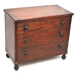 A Victorian mahogany apprentice piece chest of drawers, three graduated long drawers on bun feet,