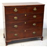 A 19th century mahogany chest of two short over three long drawers raised on ogee bracket supports,