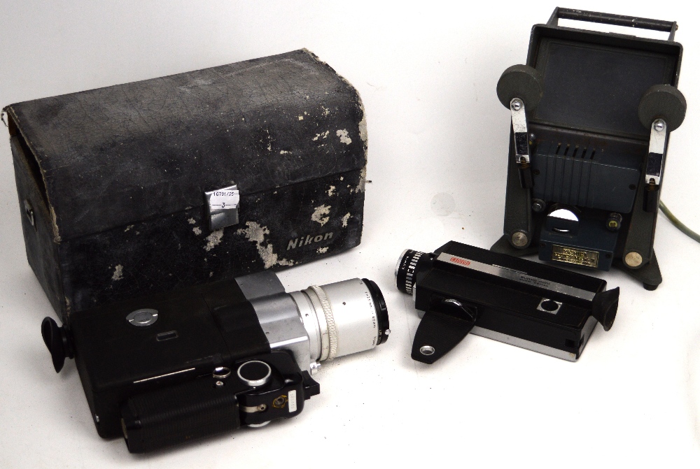 A cased Nikon 8x Superzoom 8mm movie camera with accessories,