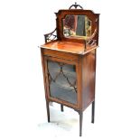 An Edwardian mahogany inlaid mirror-back display cabinet,