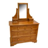 WILLIS & GAMBIER; a reproduction chest of two short and two long drawers with gallery mirror,