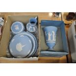 A collection of Wedgwood pale blue jasperware including a boxed vase, height 19cm,