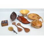 A small quantity of treen including a hardwood boat shaped bowl with carved decoration,