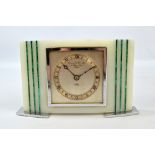 GARRARD & CO LTD; an Art Deco alabaster and malachite detailed 'Elliot' mantel clock,