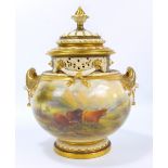 A Royal Worcester twin handled vase and cover by James Stinton,