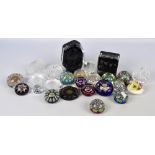 A collection of various paperweights, predominantly boxed Perthshire examples,
