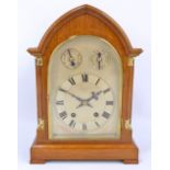 A Fattorini & Sons Ltd oak cased mantel clock,