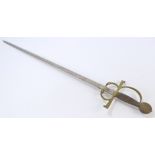 A decorative sword with metal bound grip, shaped knuckle guard and tapering blade stamped 'Toledo',