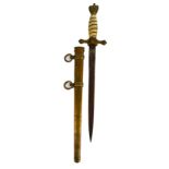 A 1950s reproduction Kriegsmarine dagger with marine ivory handle, with brass mounts and scabbard,