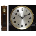 A 1920s oak longcase clock, the circular dial set with Arabic numerals, on turned bun feet,