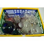 A quantity of glass including a blue/green bowl, sundae dish, various glasses,
