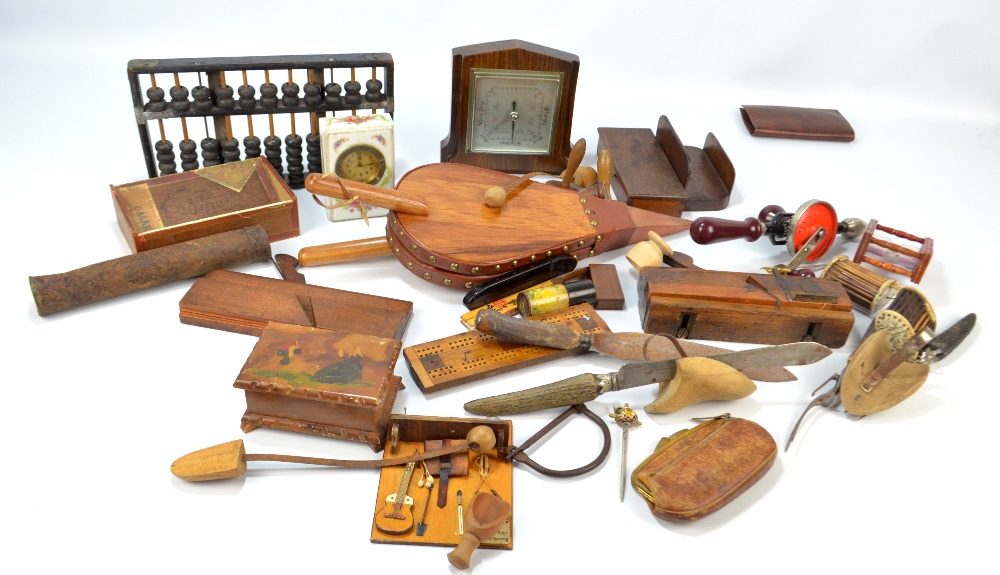 A quantity of predominantly treen collectors' items to include two planes with imprinted marks for