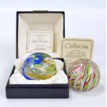 Two Caithness glass paperweights 'Parade', with certificate of authenticity number 689, boxed,