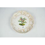 A late 19th/early 20th century Meissen plate with central panel painted with two birds amongst