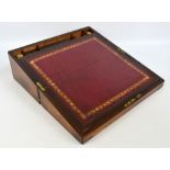 A mid-19th century rosewood and brass bound writing slope with fitted interior,