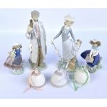 Four Lladro figures comprising lady with parasol,