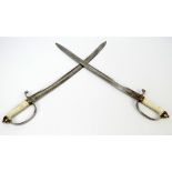 A pair of mid-19th century prison/police officer's swords with repainted white wooden grips,