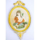 A late 18th century Prattware plaque 'Pomona, Goddess of Fruit', length 20.5cm, see Lewis, page 211.