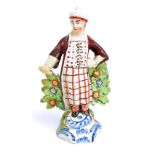 An early 19th century pearlware figure 'A Turk', height 14cm, see Halfpenny, page 211.