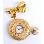 An early 20th century 15ct yellow gold half hunter crown wind fob watch overall engraved with