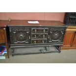 A 1920s oak geometrically moulded dresser base, length 159cm.