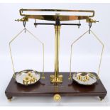 A pair of Griffin & George Limited of London and Birmingham balance scales with brown bakelite base,