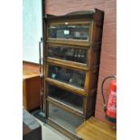 A Lebus oak and glazed five section stacking bookcase.