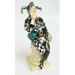 A rare Royal Doulton HN45 'Jester' figure designed by Charles Noke,