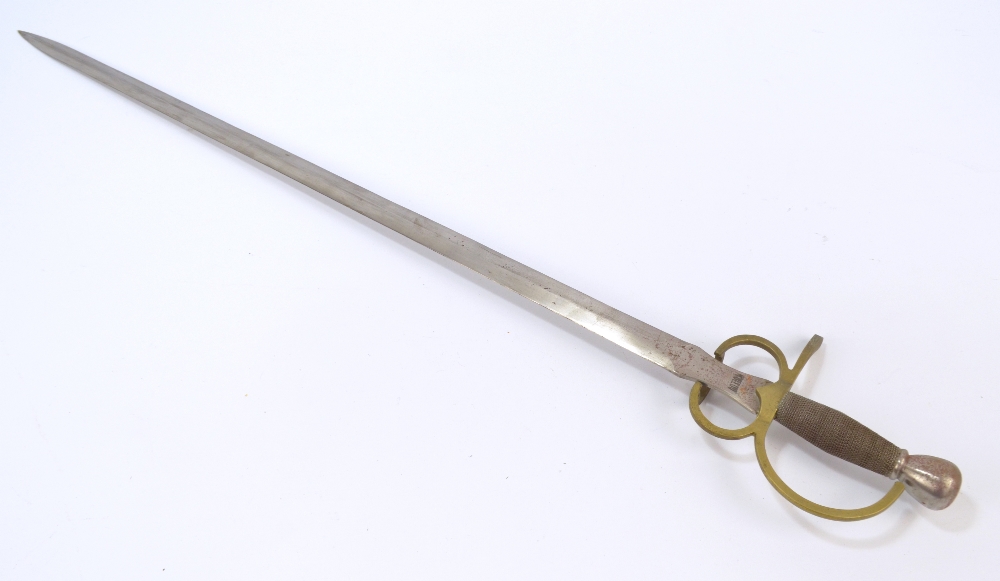 A decorative sword with metal bound grip, shaped knuckle guard and tapering blade stamped 'Toledo',
