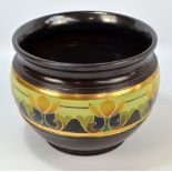 A Bretby brown glazed jardiniere with gilt heightened band, impressed marks to base number 422K,