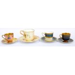 Four Royal Worcester cabinet cups to include floral decorated blush ivory example,