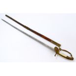 A decorative court sword with brass and mother of pearl handle inscribed 'Viribus Unitis',
