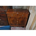 A reproduction yew wood crossbanded and boxwood strung two drawer and two door side cabinet,