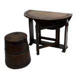 A coopered milk churn converted to a stool and a carved oak dropleaf table (2).