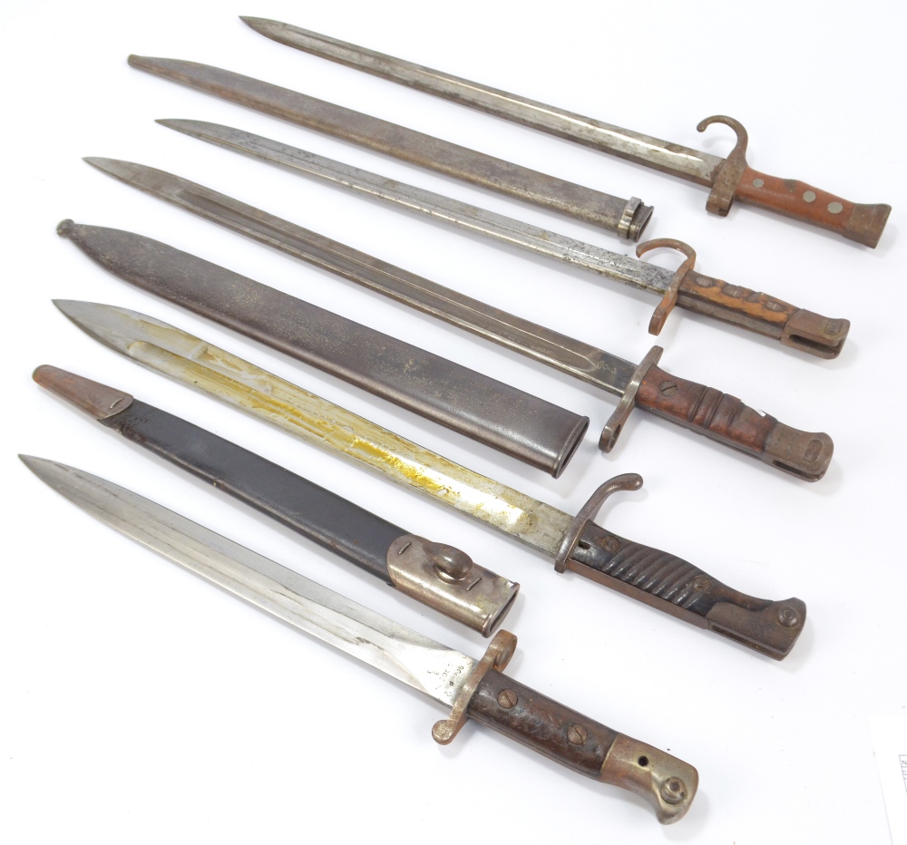 Five WWI period bayonets, including one stamped to the blade 'Waffenfabrik',