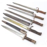 Five WWI period bayonets, including one stamped to the blade 'Waffenfabrik',
