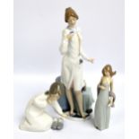 Three Lladro figures, 'Female Physician',