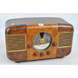 An Art Deco walnut and burr walnut Nicoletta 1MCIF51 radio with five bakelite adjusting knobs,