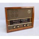 A vintage Murphy walnut case radio, width 53.5cm.