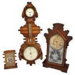 A late 19th century/early 20th century American Ansonia gingerbread eight day mantel clock,
