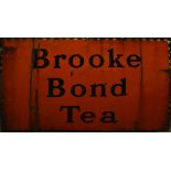 A Brooke Bond Tea enamel sign with checkered border, 101 x 152cm.