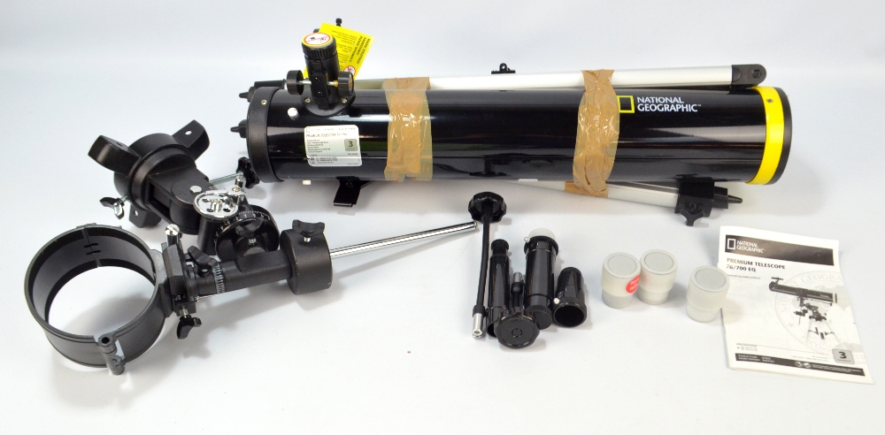 A National Geographic Premium Telescope 76-700 with tripod and accessories.