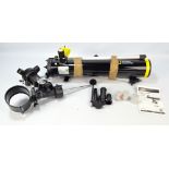 A National Geographic Premium Telescope 76-700 with tripod and accessories.