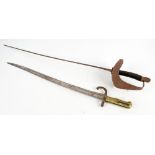 A 19th century French Chassepot bayonet with curved blade and ribbed brass grip,