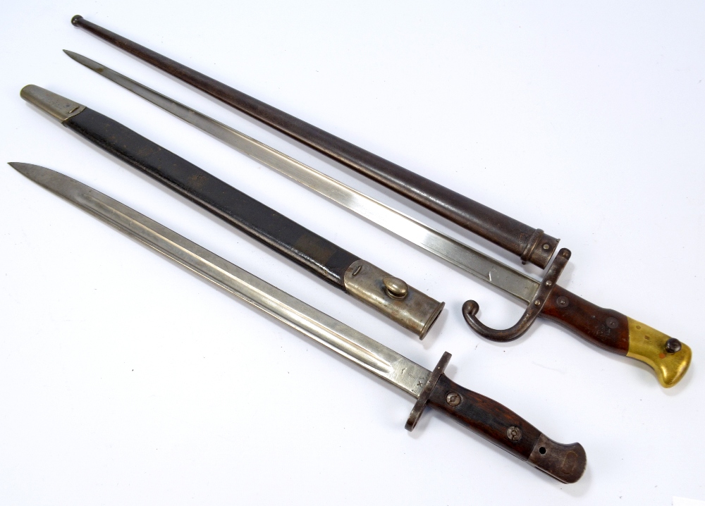 A late 19th century French Chassepot bayonet with metal scabbard,
